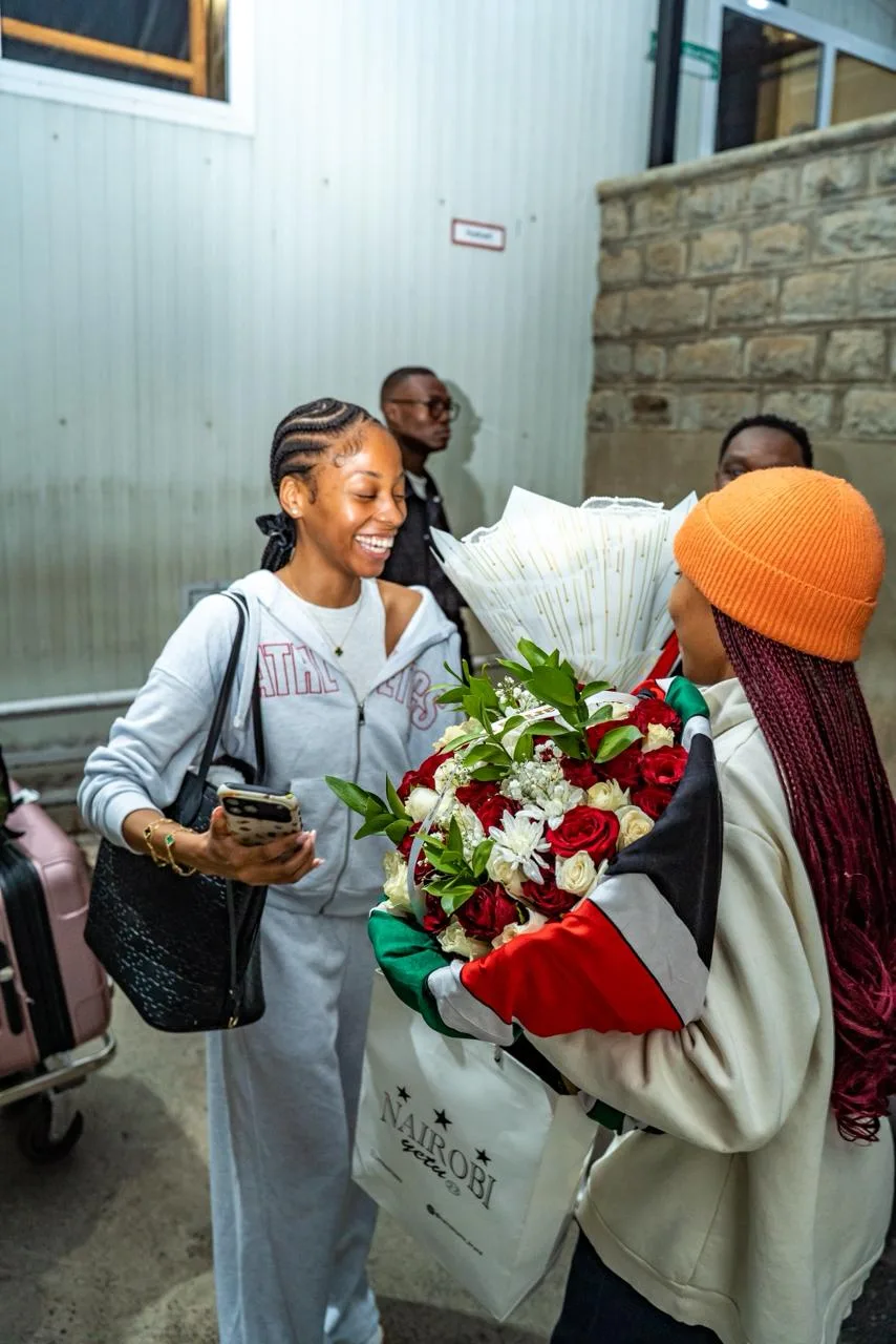 A welcome bouquet handed over at the airport
