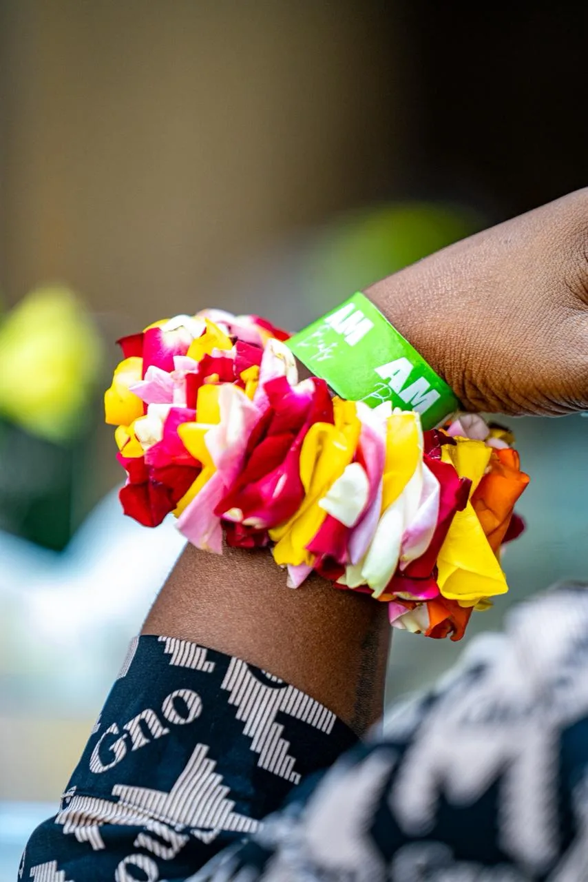Guests at the AM Beats activation wearing Florence wrist corsages